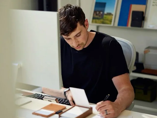 Designer sketching at desk